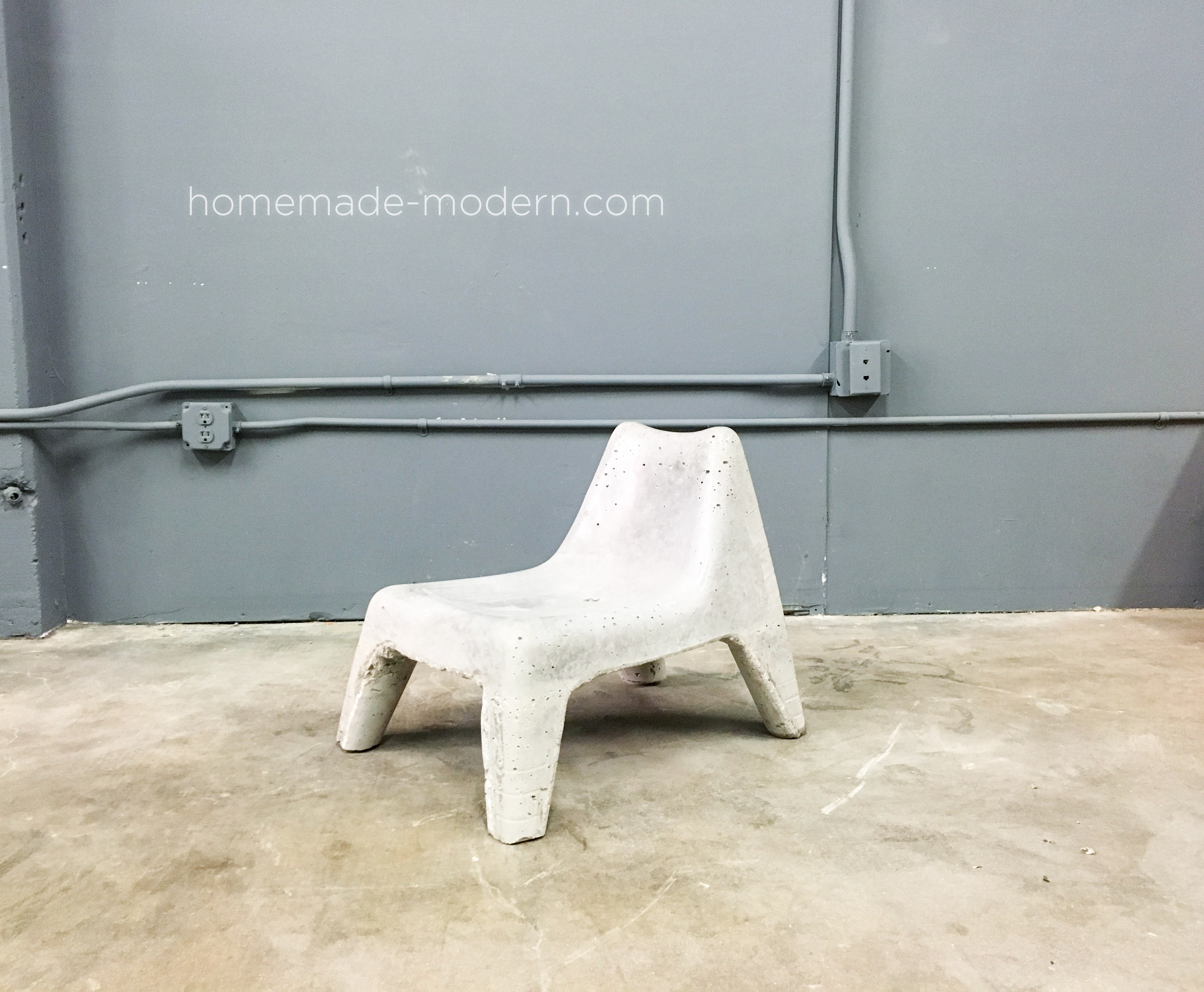 This DIY Concrete Chair was cast in a plastic chair from IKEA. For more information go to HomeMade-Modern.com