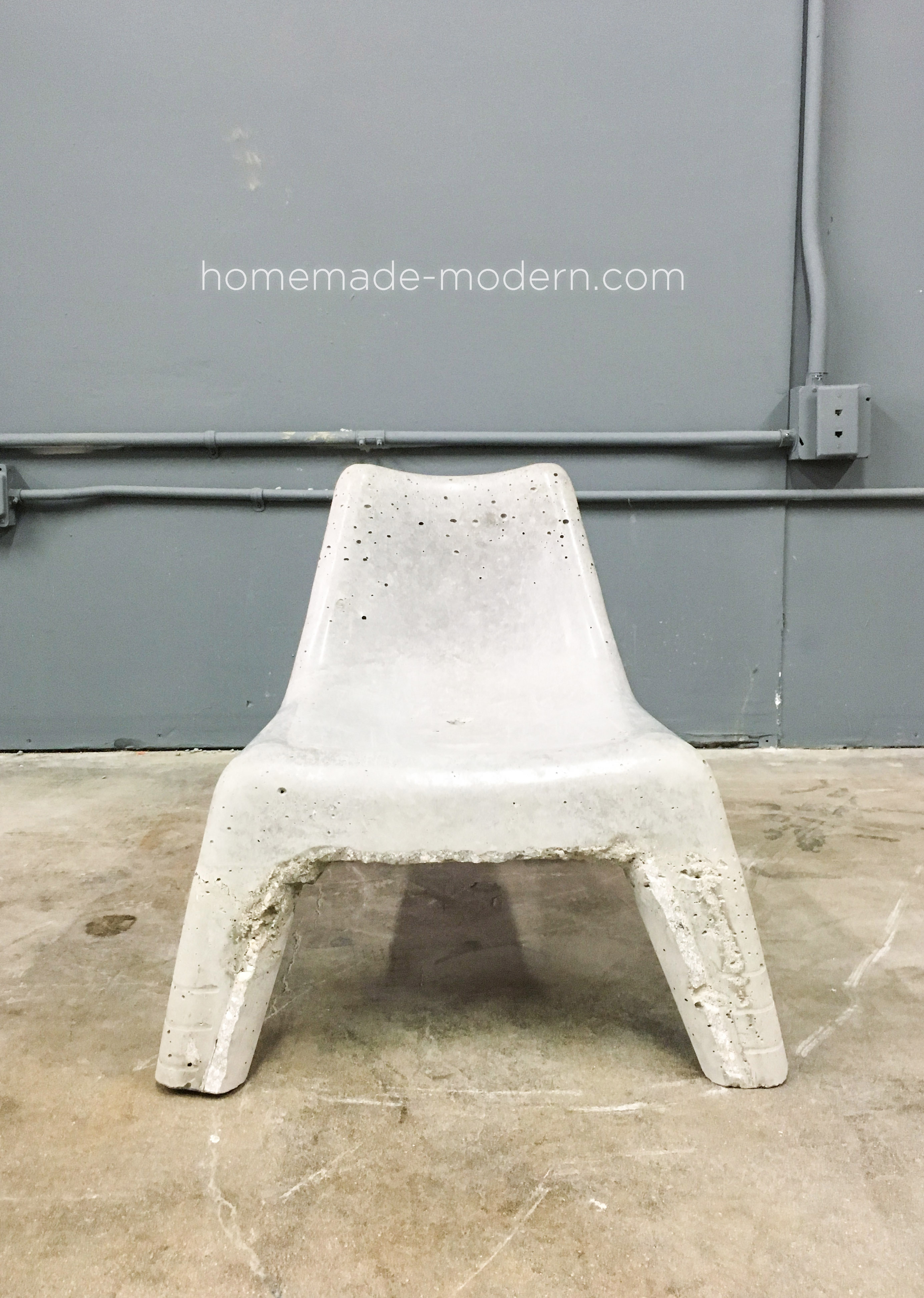 This DIY Concrete Chair was cast in a plastic chair from IKEA. For more information go to HomeMade-Modern.com