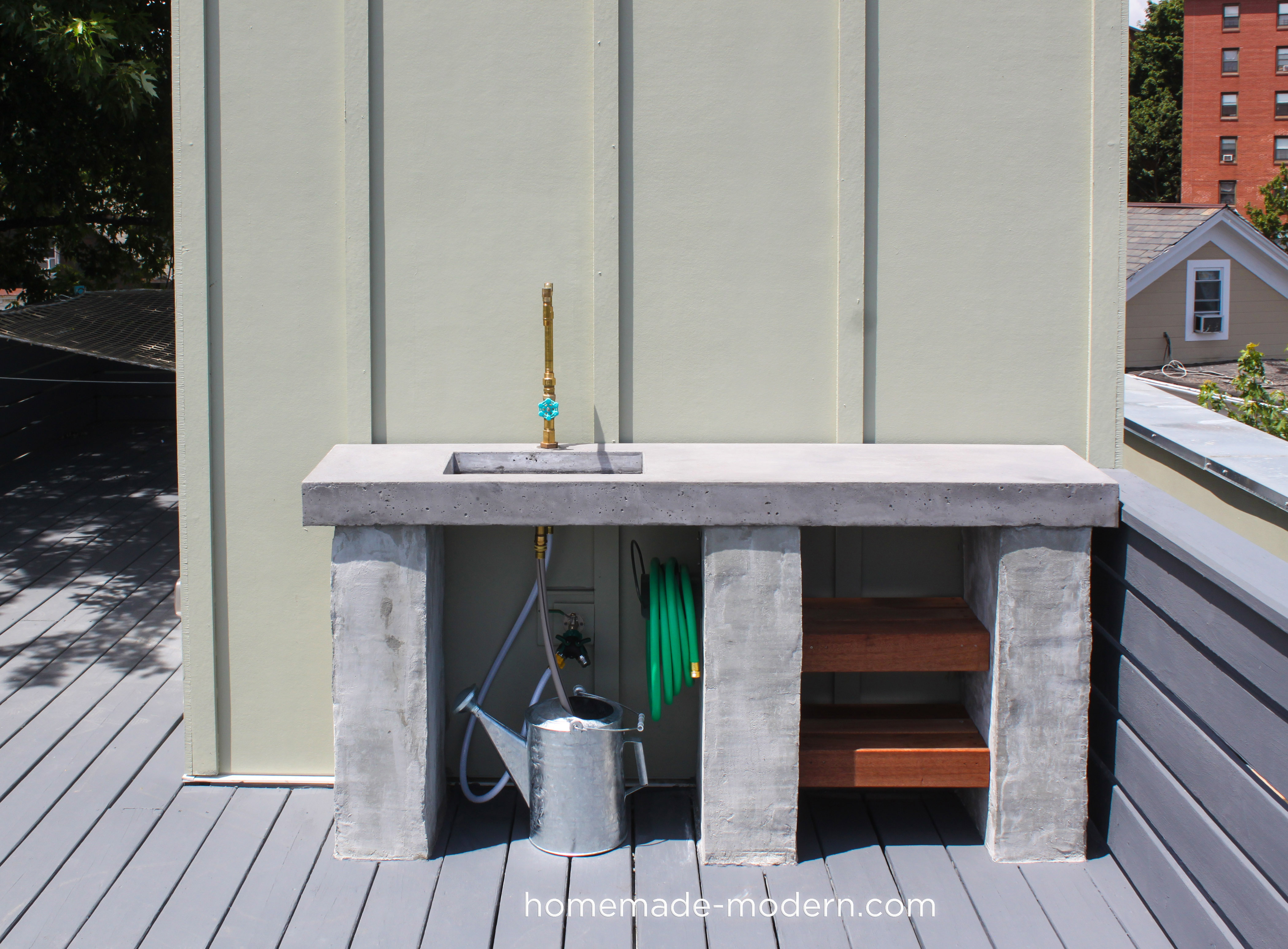 This DIY Outdoor Kitchen with Concrete Countertop is convenient for your deck, patio or outdoor garden. Full instructions can be found at HomeDepot.com