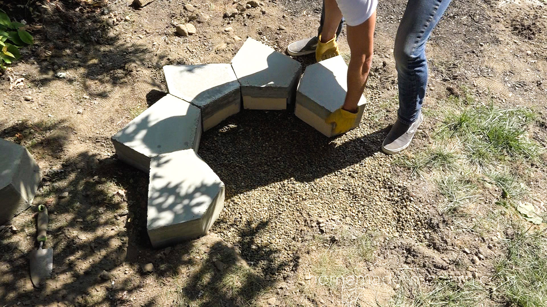 This modular modern concrete fire pit was made from Quikrete 5000 and cost less than $120 to build. The forms for the pieces were made with a small CNC machine. For more information go to HomeMade-Modern.com