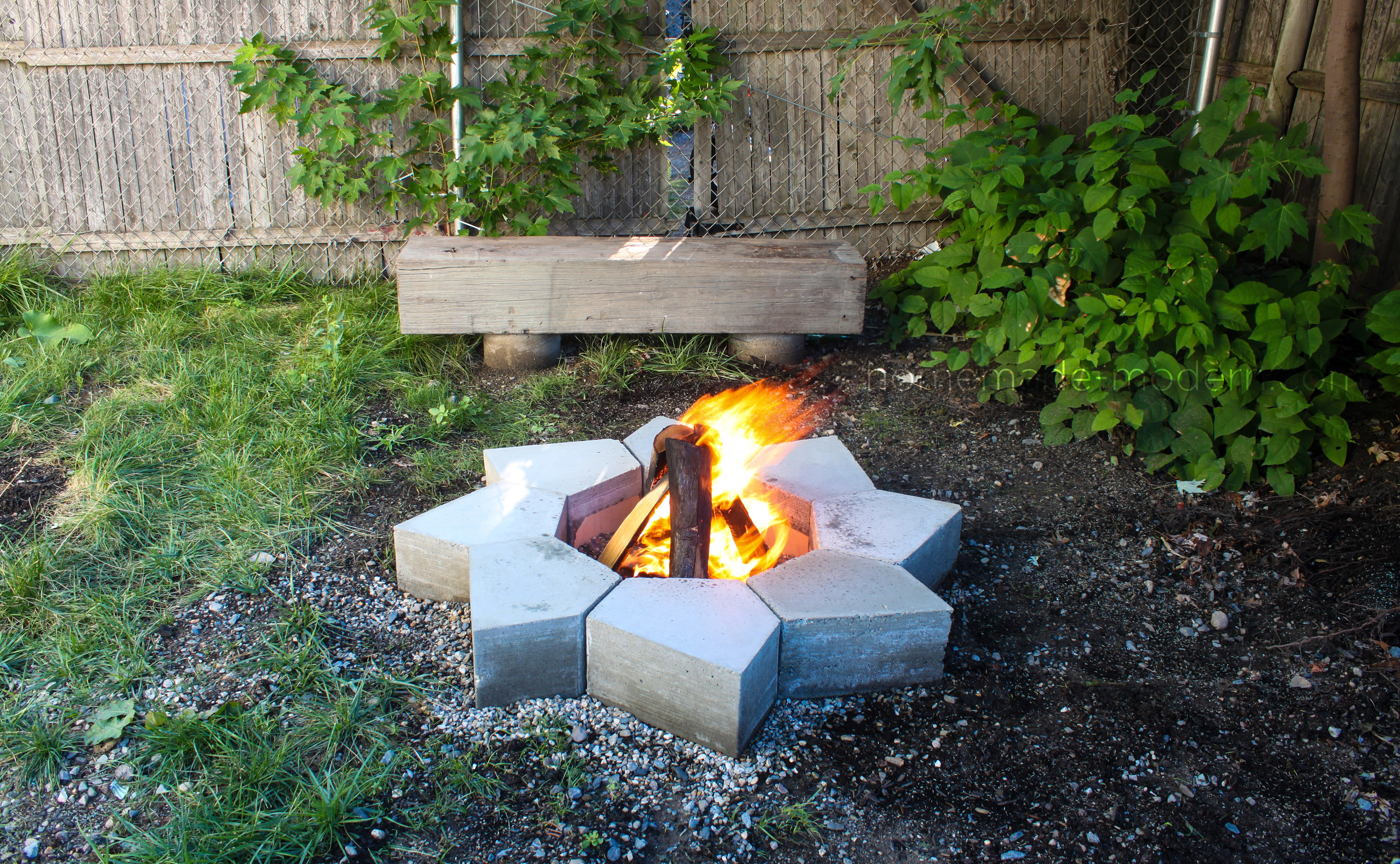 This modular modern concrete fire pit was made from Quikrete 5000 and cost less than $120 to build. The forms for the pieces were made with a small CNC machine. For more information go to HomeMade-Modern.com
