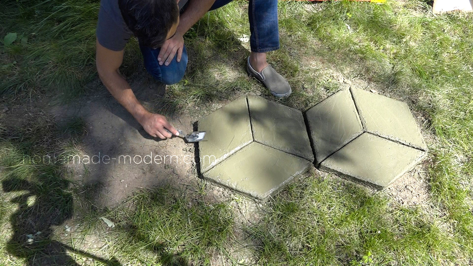 These modular modern concrete pavers was made from Quikrete 5000. The forms for the pieces were made with small CNC machine. For more information go to HomeMade-Modern.com