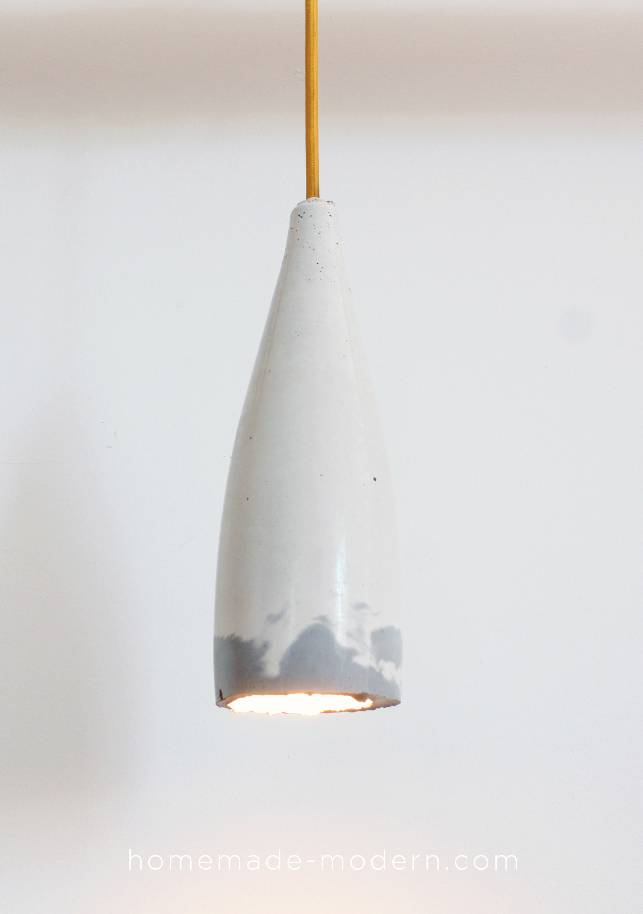 These DIY concrete lamps are easy and affordable to make. For more information go to HomeMade-Modern.com