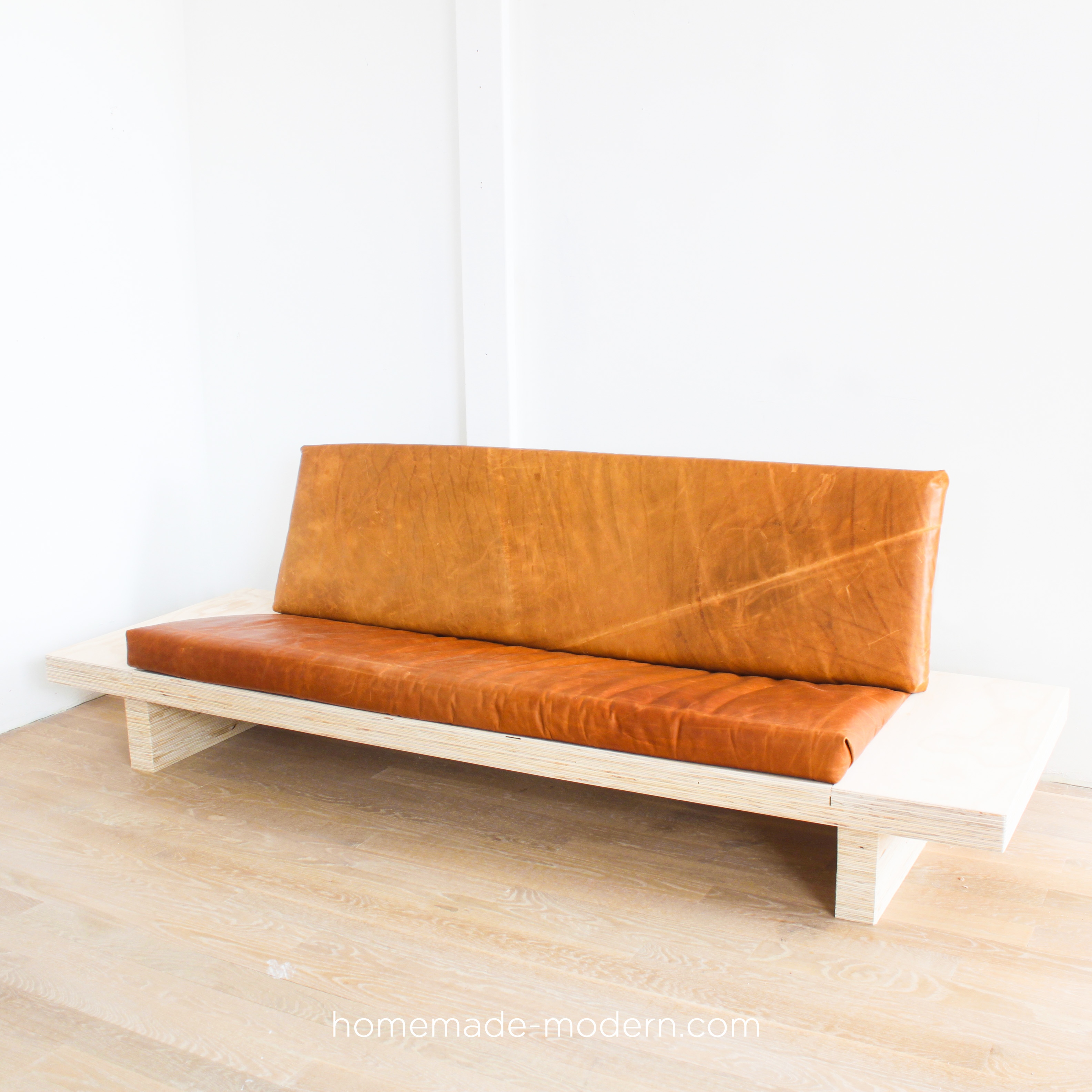 This DIY modern plywood sofa is made out of 2-1/2” sheets of ¾” plywood from Home Depot. Full instructions can be found at HomeMade-Modern.com