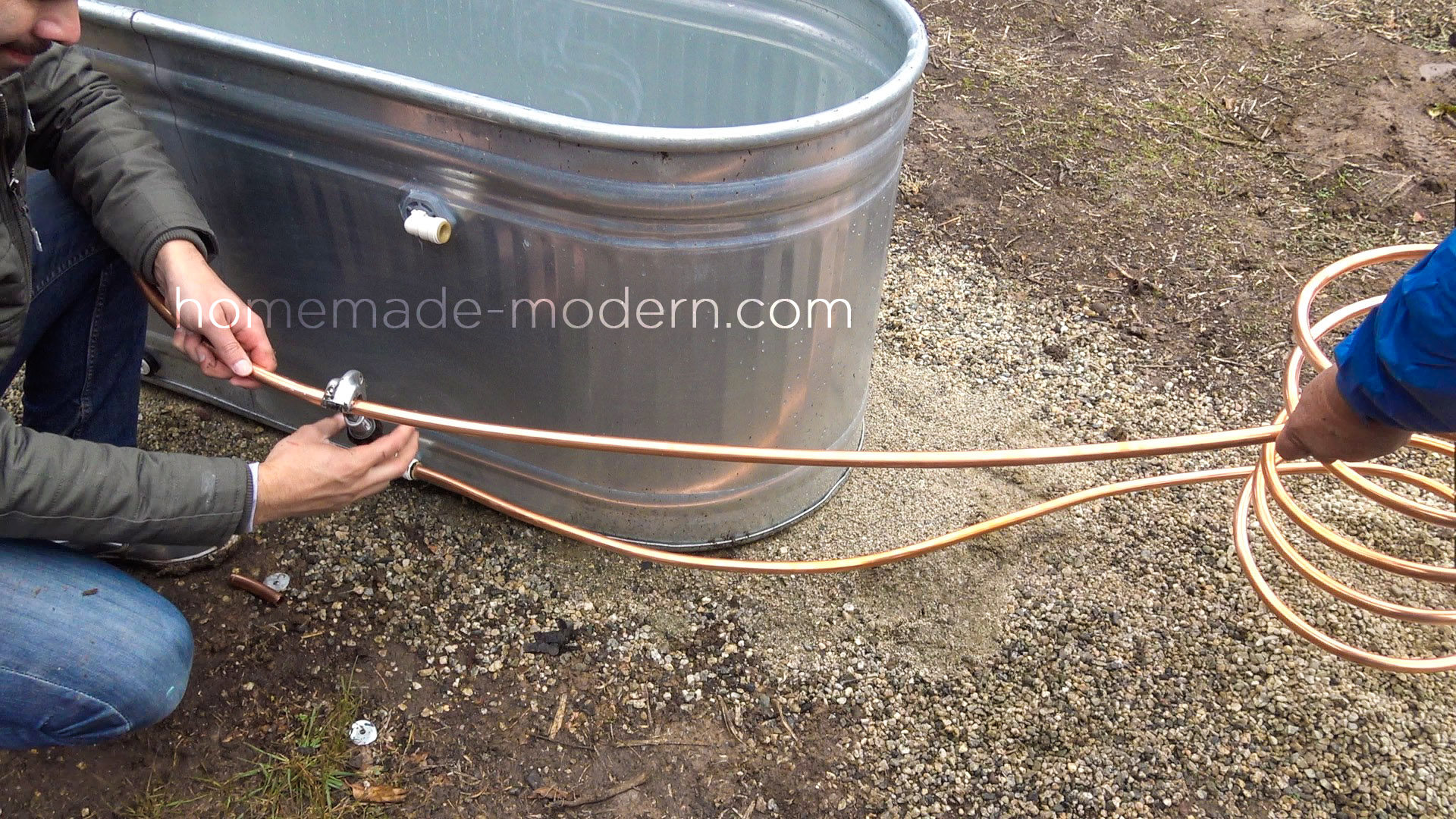 This DIY wood fired Hot Tub is made from a stock tank and copper tubing and cost less than $250. Full instructions can be found at HomeMade-Modern.com