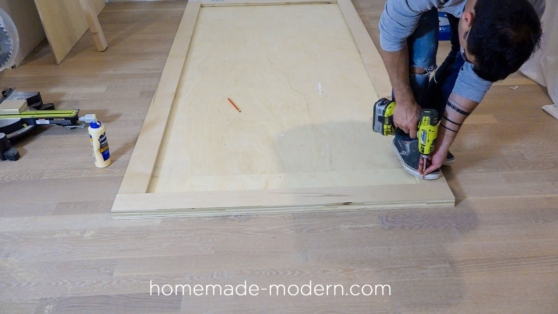 This fold-out gym is perfect for crossfit style exercise routines at home and is made from plywood. Full instructions can be found at HomeMade-Modern.com