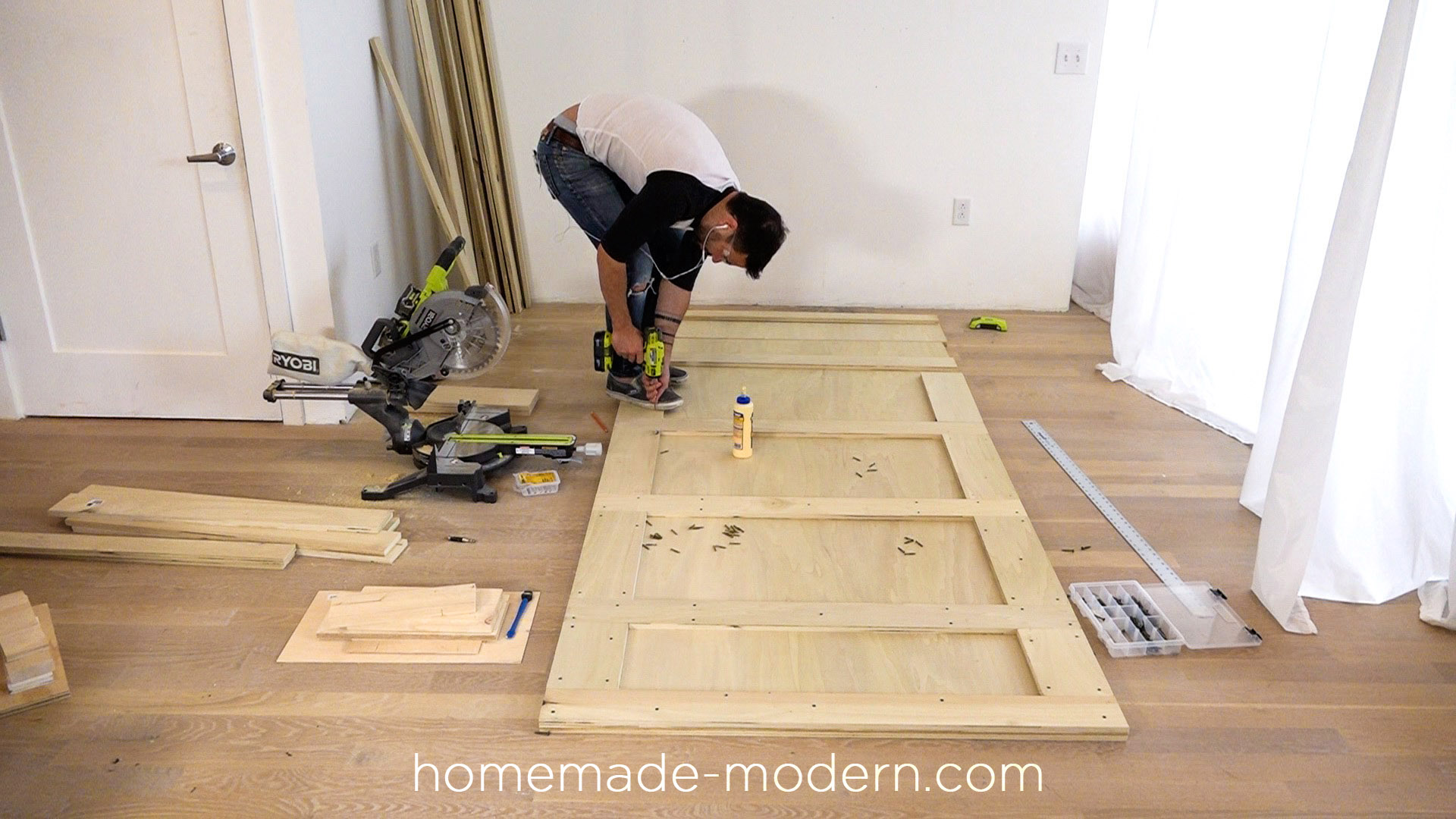 This fold-out gym is perfect for crossfit style exercise routines at home and is made from plywood. Full instructions can be found at HomeMade-Modern.com