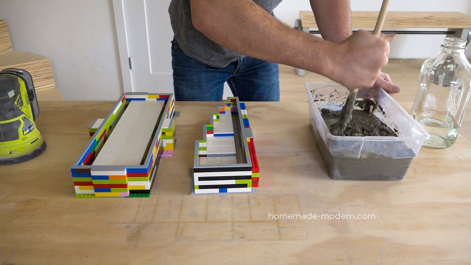 This DIY concrete backsplash was made using Lego bricks to form concrete. The Lego bricks were not damaged during this process. For more information on this project and on DIY concrete countertops go to HomeMade-Modern.com