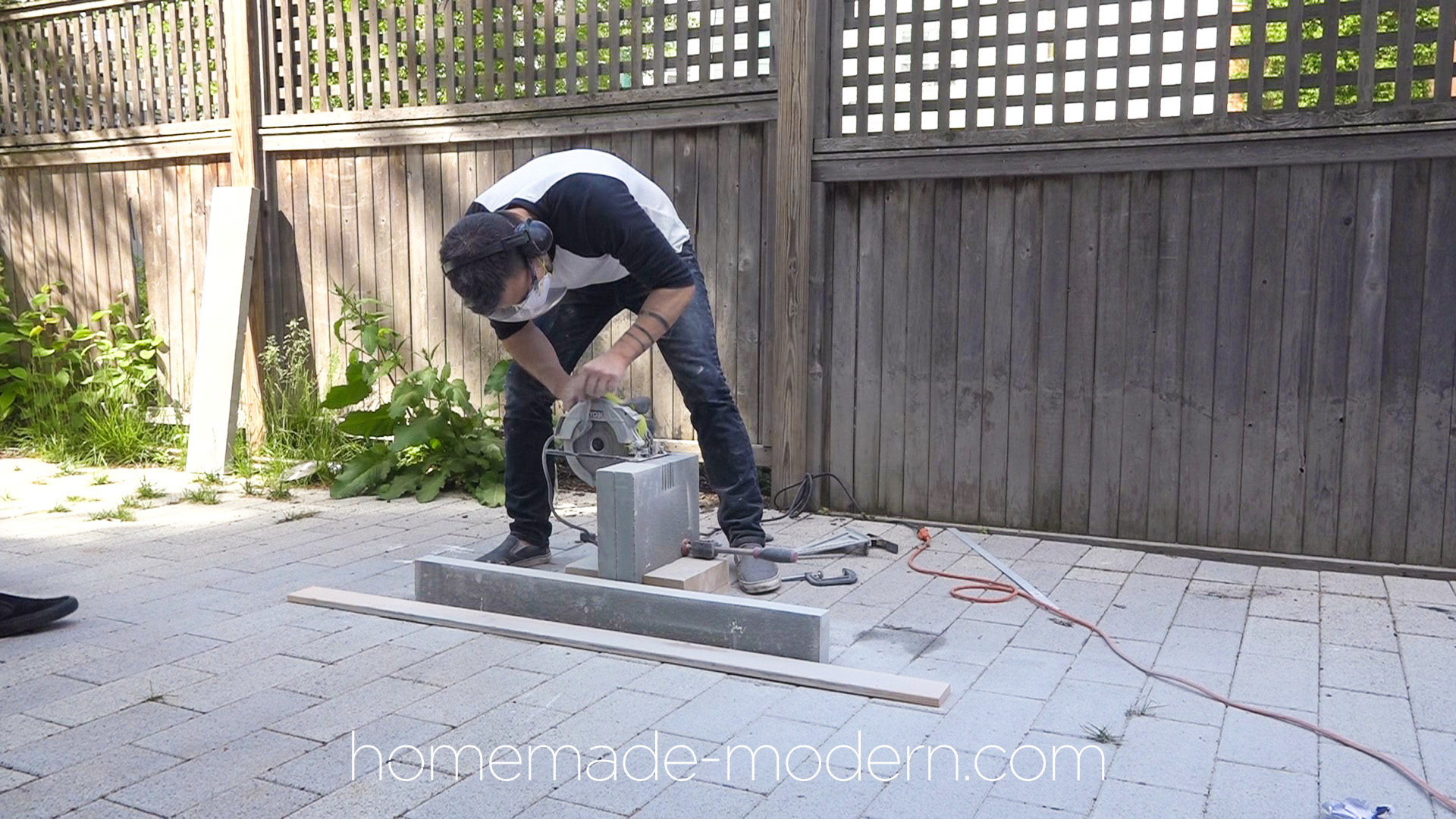 This DIY stone bench was made out of 2” thick slabs of bluestone that was cut with a standard circular saw. For more information go to HomeMade-Modern.com