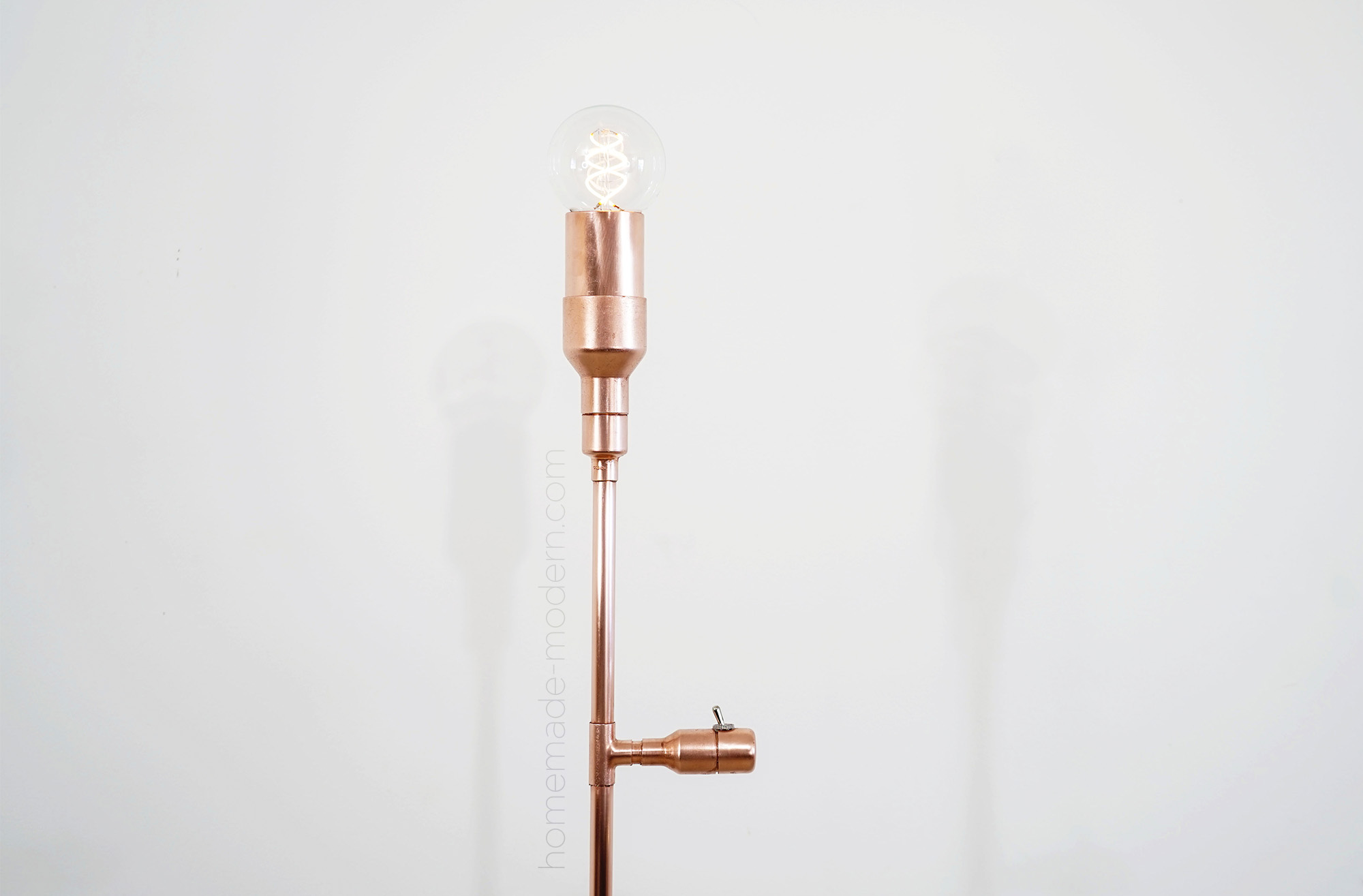 This DIY copper lamp was made out of copper pipes from Home Depot. For more information go to HomeMade-Modern.com