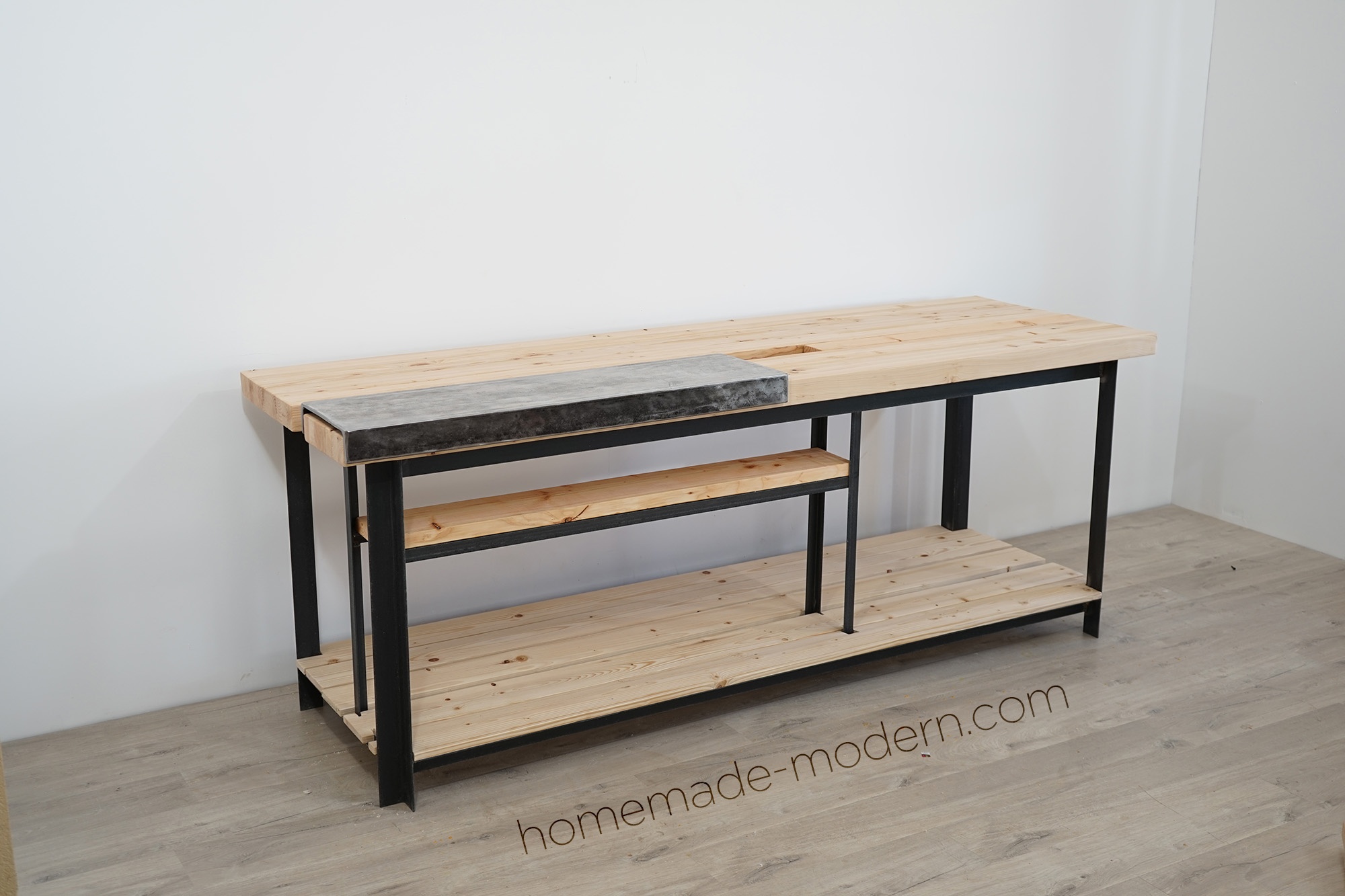 Ben Uyeda of HomeMade Modern designed and built this split top workbench with a removable steel top. For more information go to HomeMade-Modern.com