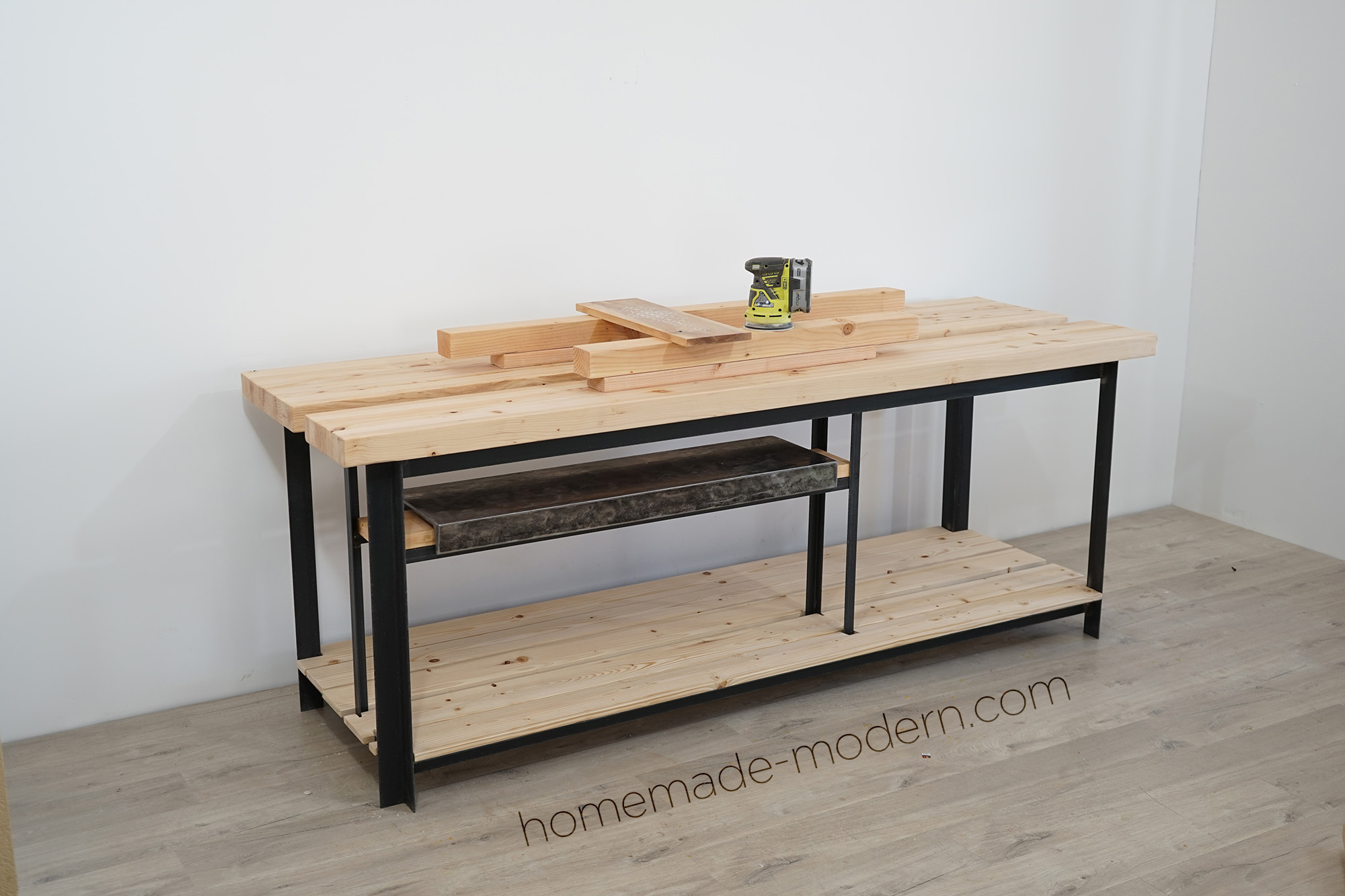 Ben Uyeda of HomeMade Modern designed and built this split top workbench with a removable steel top. For more information go to HomeMade-Modern.com